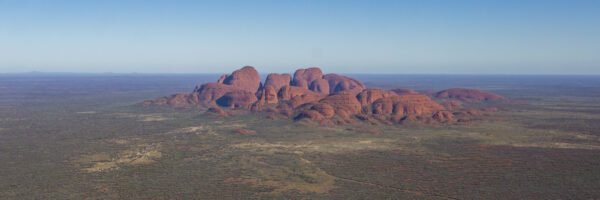 This image of the eastern face of Kata-Tjuta was taken from a helicopter mid morning in Uluru-Kata Tjuta National Park and UNESCO Heritage site 