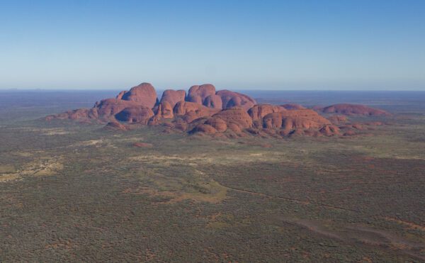 This image of the eastern face of Kata-Tjuta was taken from a helicopter mid morning in Uluru-Kata Tjuta National Park and UNESCO Heritage site in the Northern Territory, Australia.